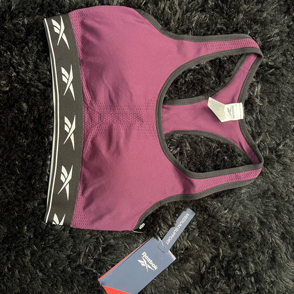 Brand new Reebok size medium plum purple sports bra.